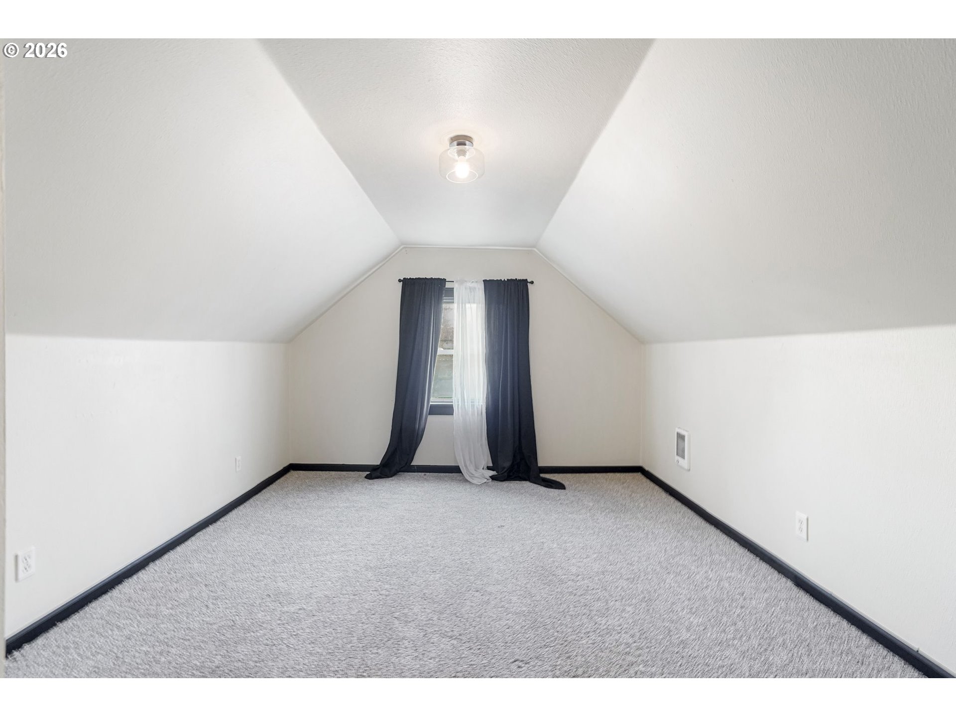 4810 Rickman Road Northeast Keizer, OR 97303 - Photo 30 of 42 a view of an empty room with a window