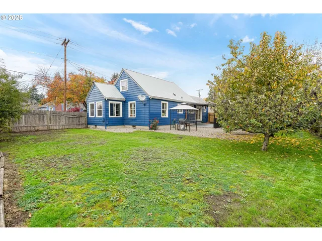 a backyard of a house with lots of green space