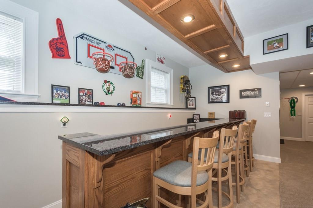 36 Corn Road Bolton, MA 01740 - Photo 26 of 39 a view of a dining room with furniture
