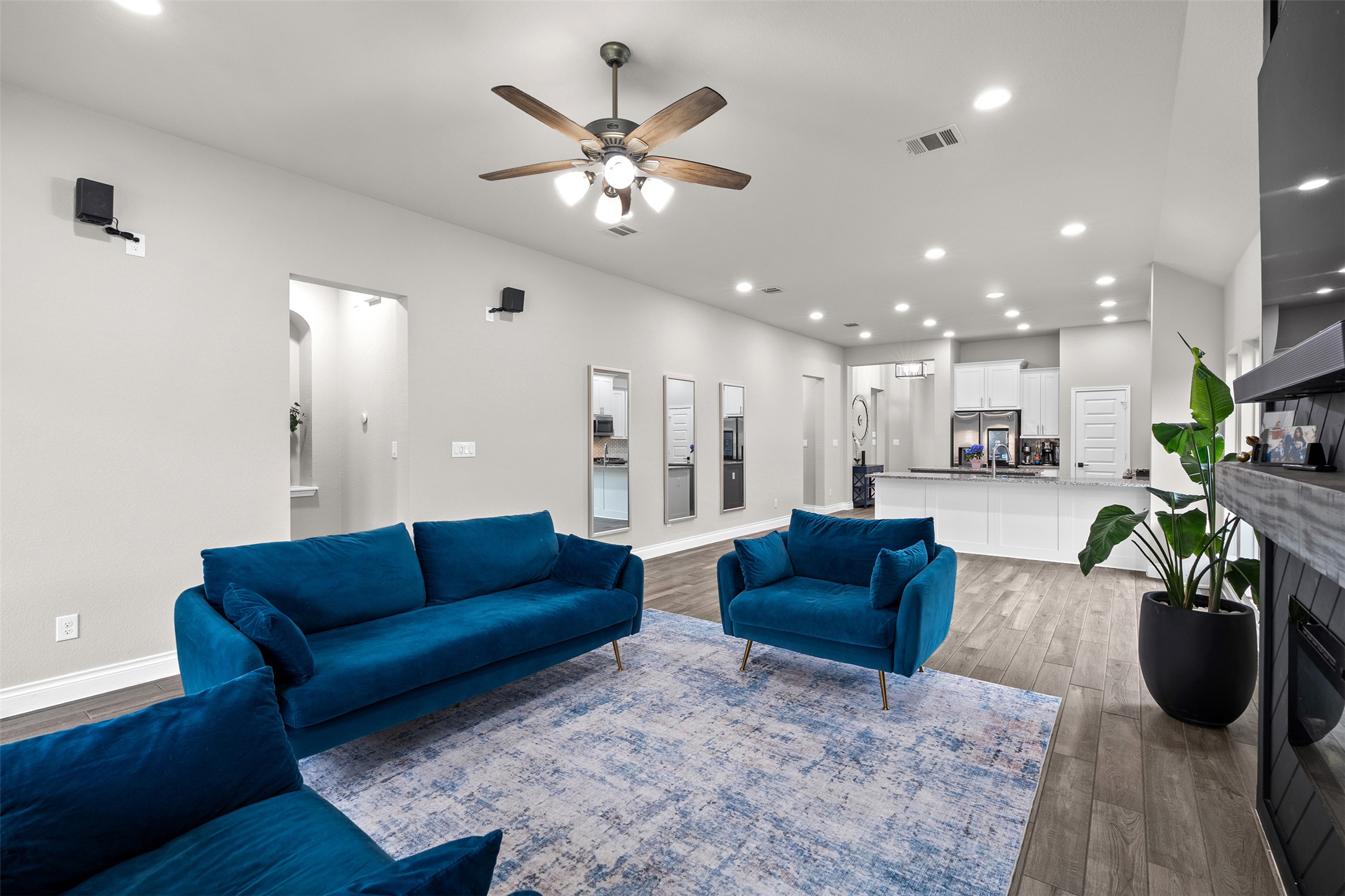 341 Pisa Lane Georgetown, TX 78628 - Photo 18 of 31 a living room with furniture a couch and kitchen view