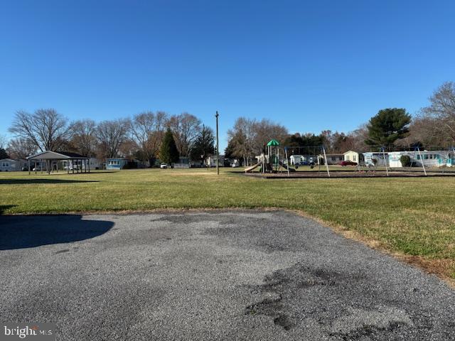 31706 Janice Road Lewes, DE 19958 - Photo 20 of 20 a view of a golf course with beach