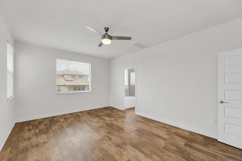 a kitchen with stainless steel appliances granite countertop a sink stove and microwave