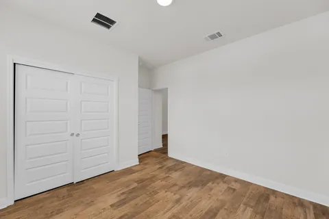 a bathroom with a sink vanity and a mirror