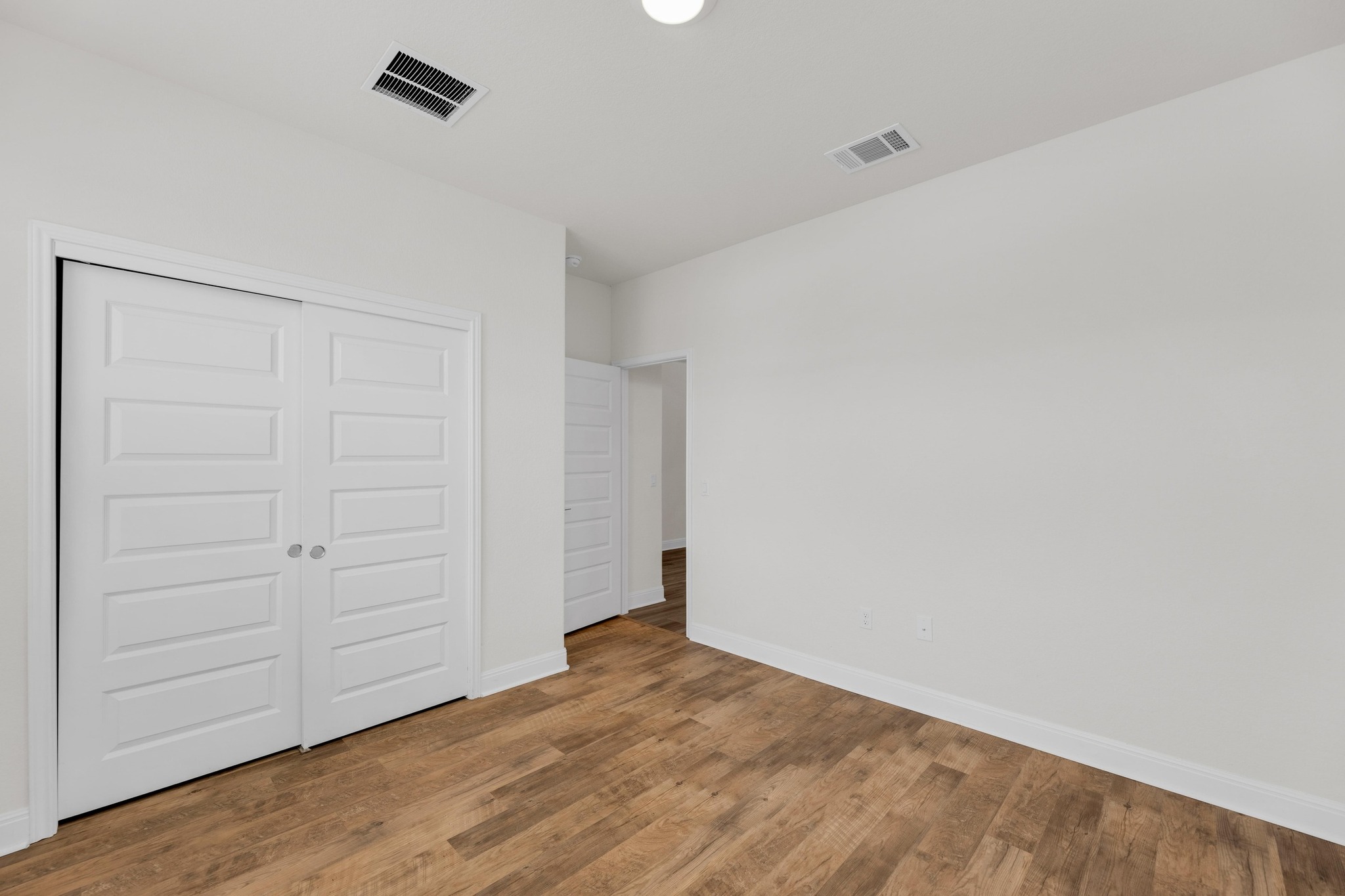 16817 Ponte Cove Pflugerville, TX 78660 - Photo 24 of 36 wooden floor in an empty room