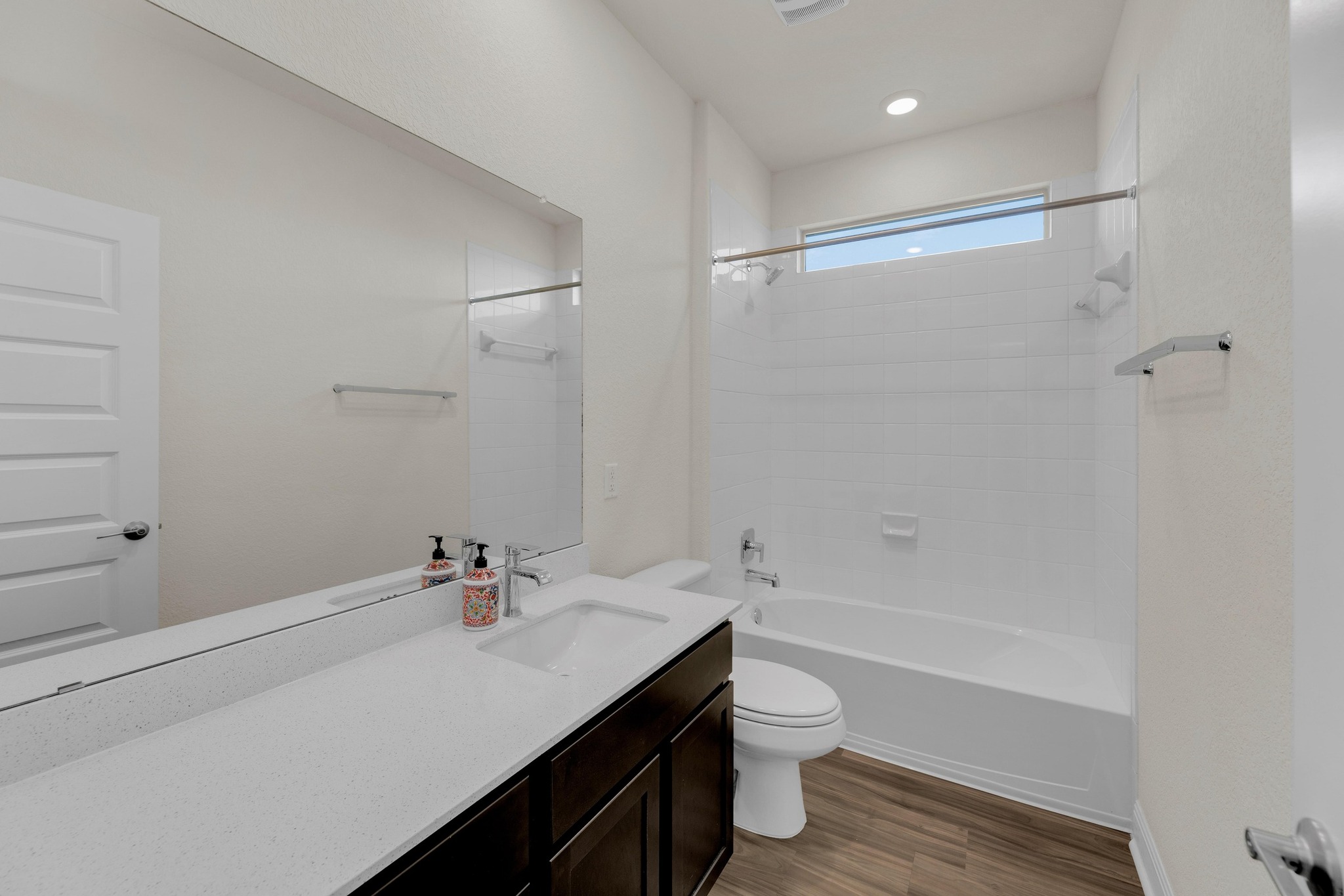 16817 Ponte Cove Pflugerville, TX 78660 - Photo 27 of 36 a bathroom with a sink a toilet and shower