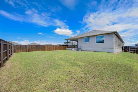a view of balcony with furniture