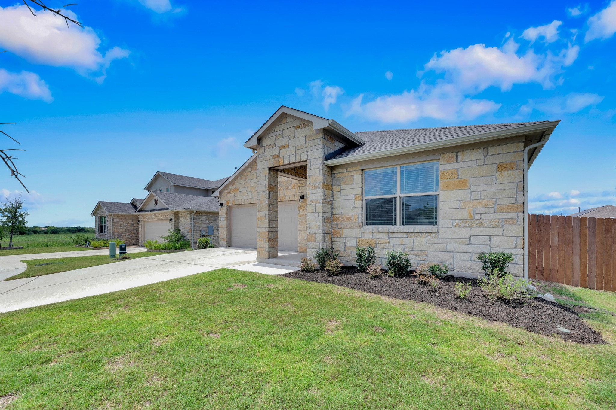 16817 Ponte Cove Pflugerville, TX 78660 - Photo 6 of 36 a front view of a house with a yard and pathway