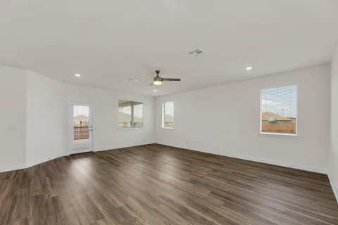 a front view of a house with a yard and pathway