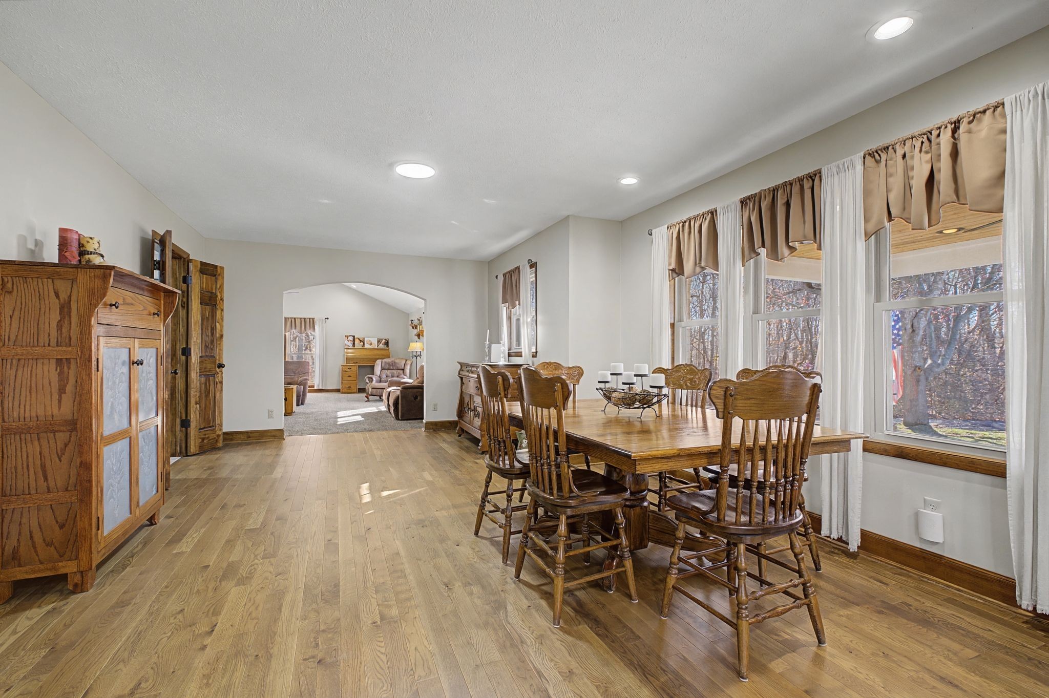 1231 Abiff Road Bon Aqua, TN 37025 - Photo 18 of 60 a view of a dining room with furniture window and wooden floor