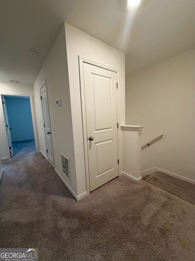 35300 Condor Court Southwest Atlanta, GA 30331 - Photo 13 of 31 an empty room with white cabinet and mirrors