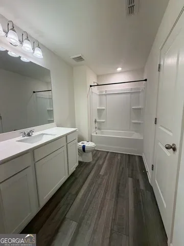 a view of a room with racks on the wall