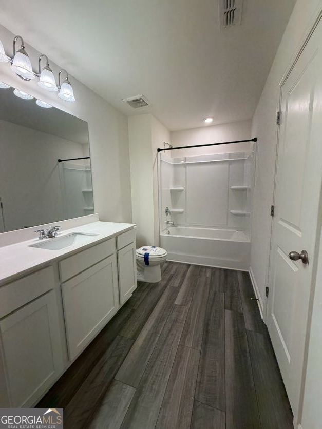 35300 Condor Court Southwest Atlanta, GA 30331 - Photo 18 of 31 a bathroom with a sink a mirror and a shower