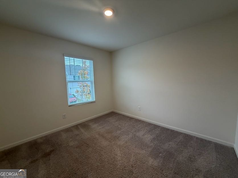 35300 Condor Court Southwest Atlanta, GA 30331 - Photo 20 of 31 an empty room with a window