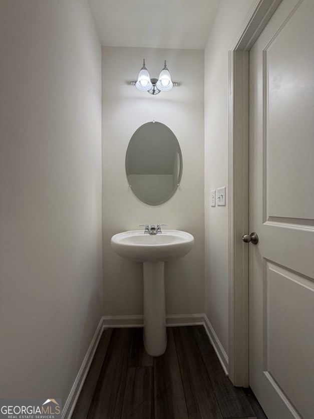 35300 Condor Court Southwest Atlanta, GA 30331 - Photo 7 of 31 a bathroom with a sink and a mirror