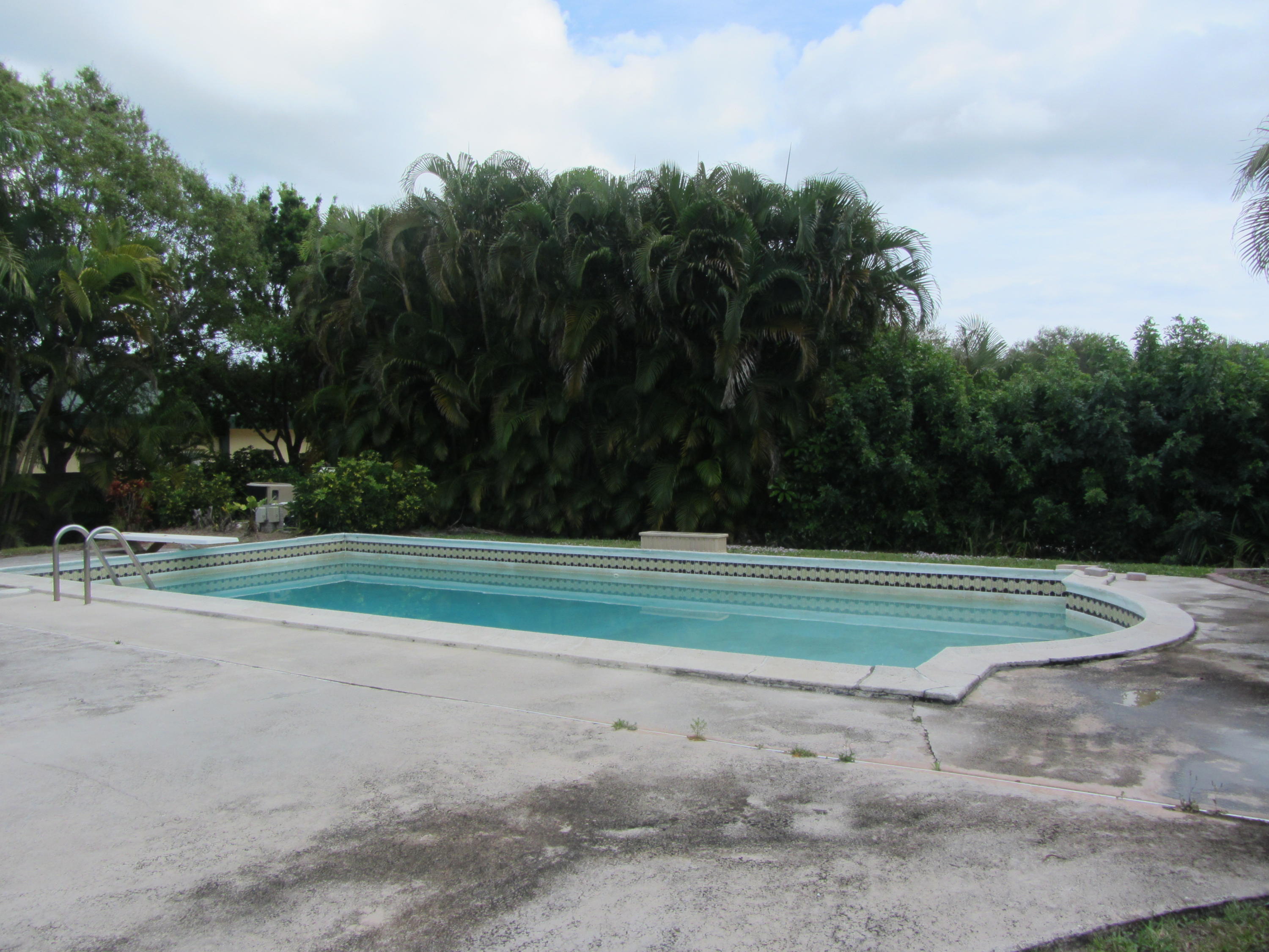 719 N Road Jupiter, FL 33458 - Photo 4 of 24 IMG_5395