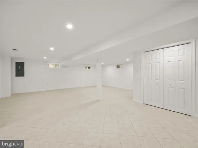 a bathroom with a sink a toilet and a tub