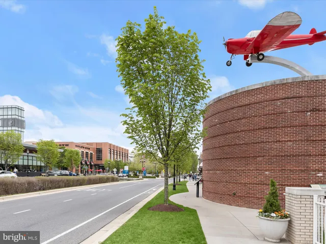a view of a brick building with many windows