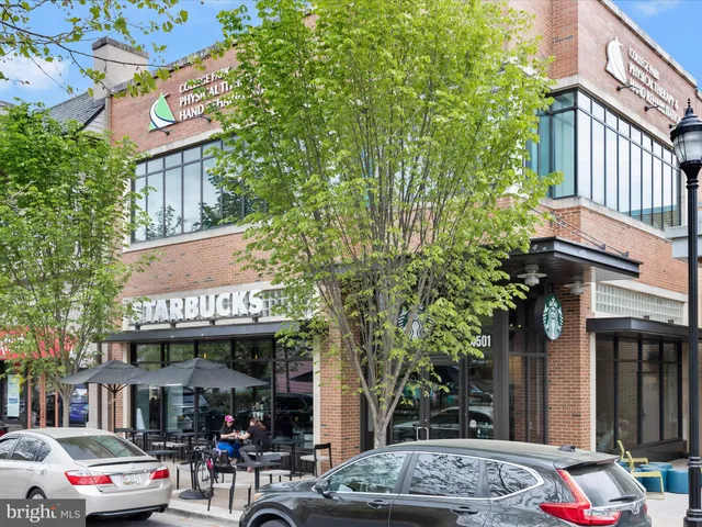 a picture of a room with a white wall and sign