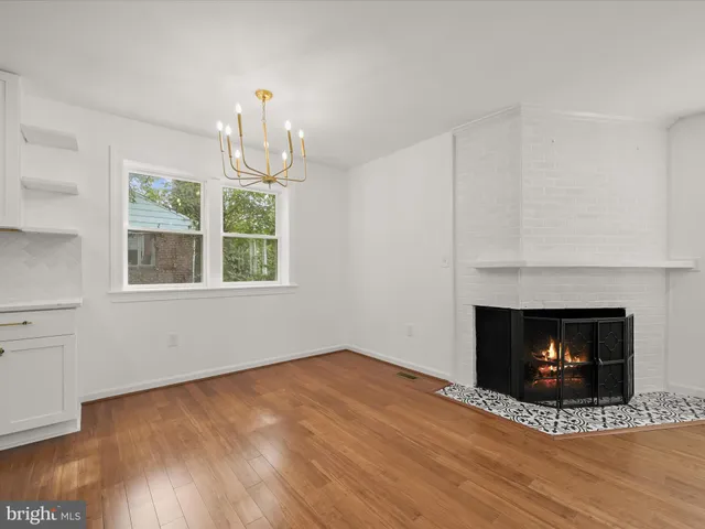 a room with fireplace and a fireplace