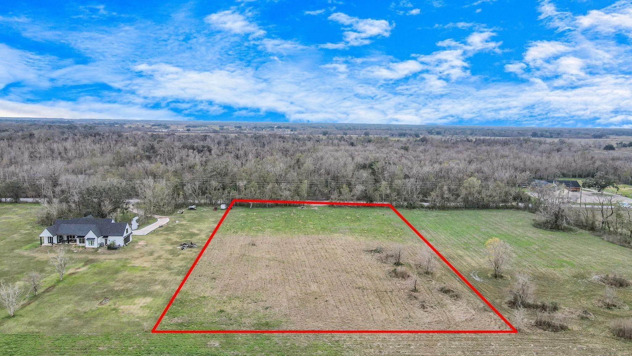 1402 County Road 34 Angleton, TX 77515 - Photo 5 of 10 a view of a backyard with swimming pool