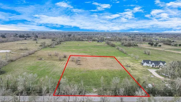 a view of swimming pool with a yard