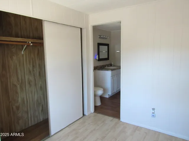 a bathroom with a toilet and a sink