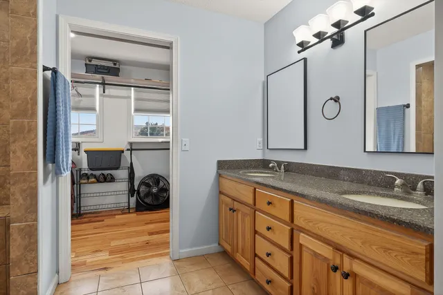 a view of a patio with a table chairs and a backyard