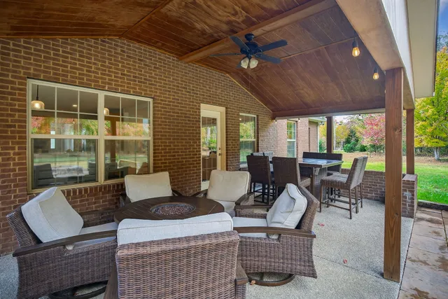 a room with gym equipment and a large window