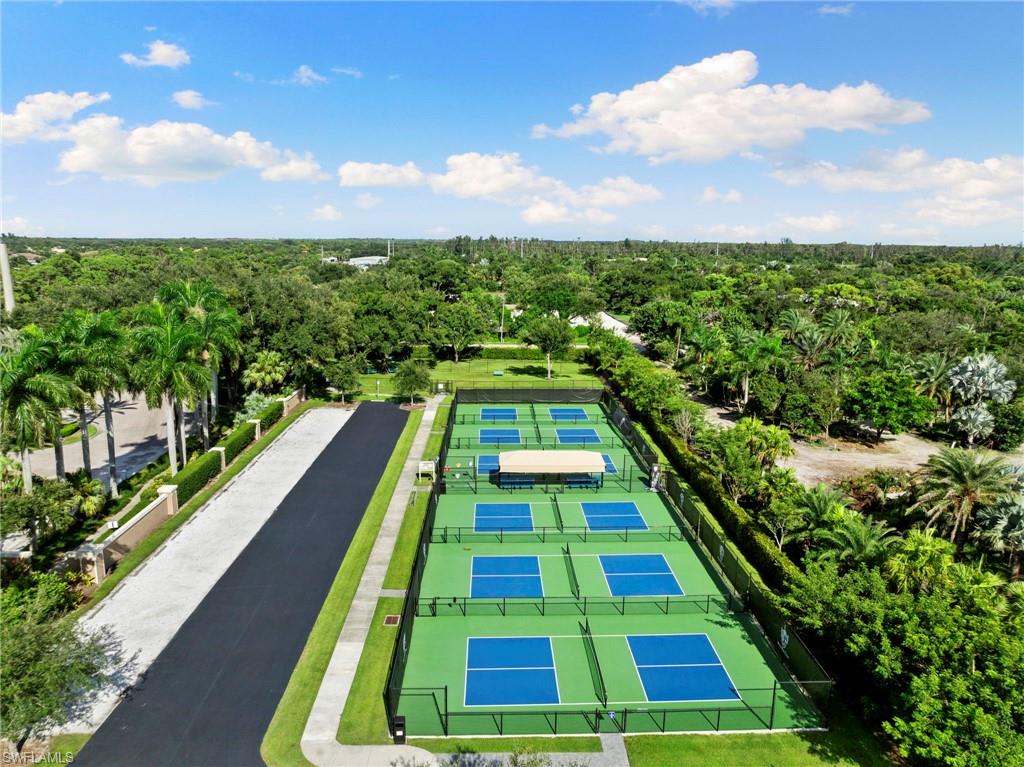 19013 Ridgepoint Drive Estero, FL 33928 - Photo 38 of 42 a view of swimming pool with a yard