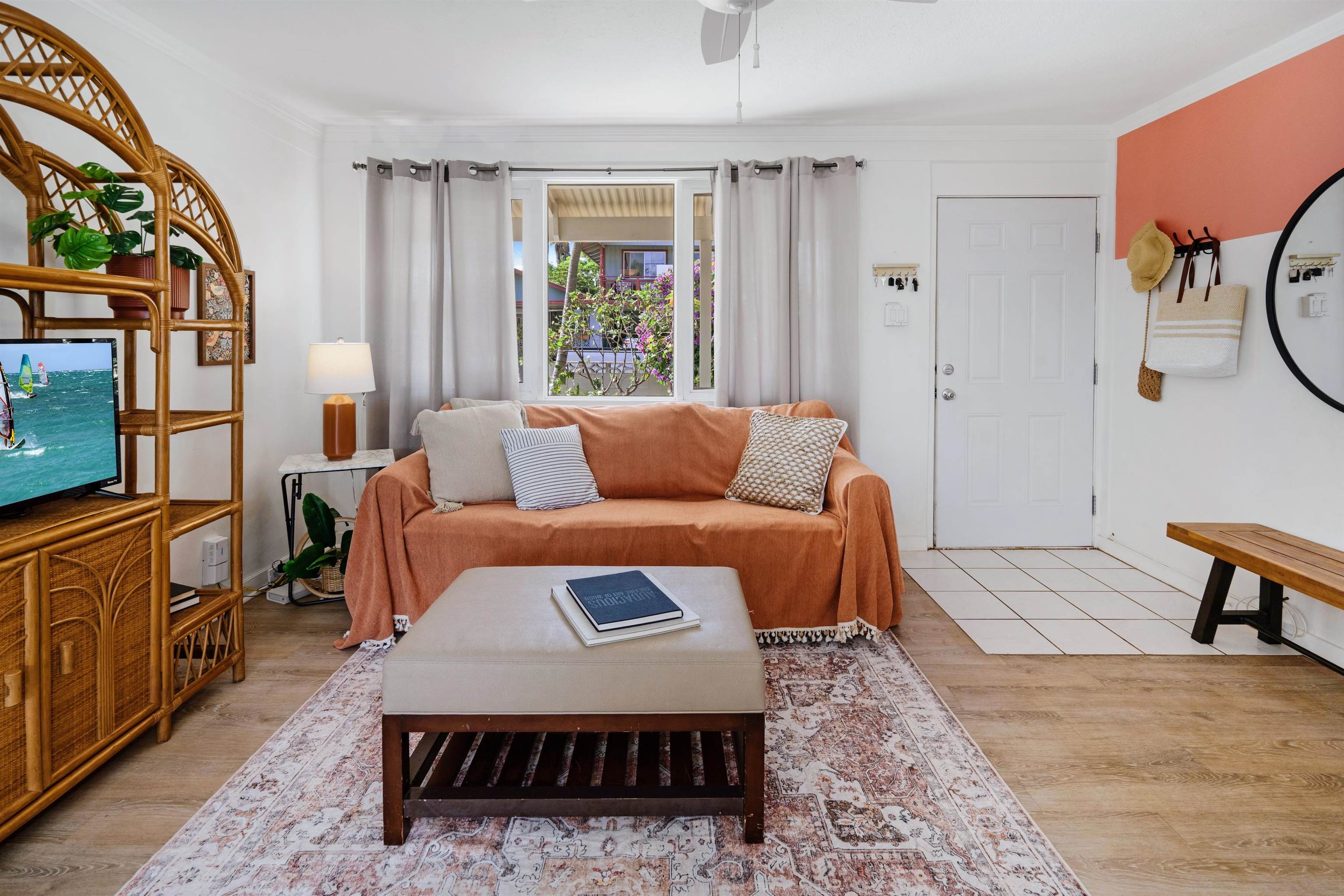 339 Manini Place Kihei, HI 96753 - Photo 11 of 34 a living room with furniture a rug and a window