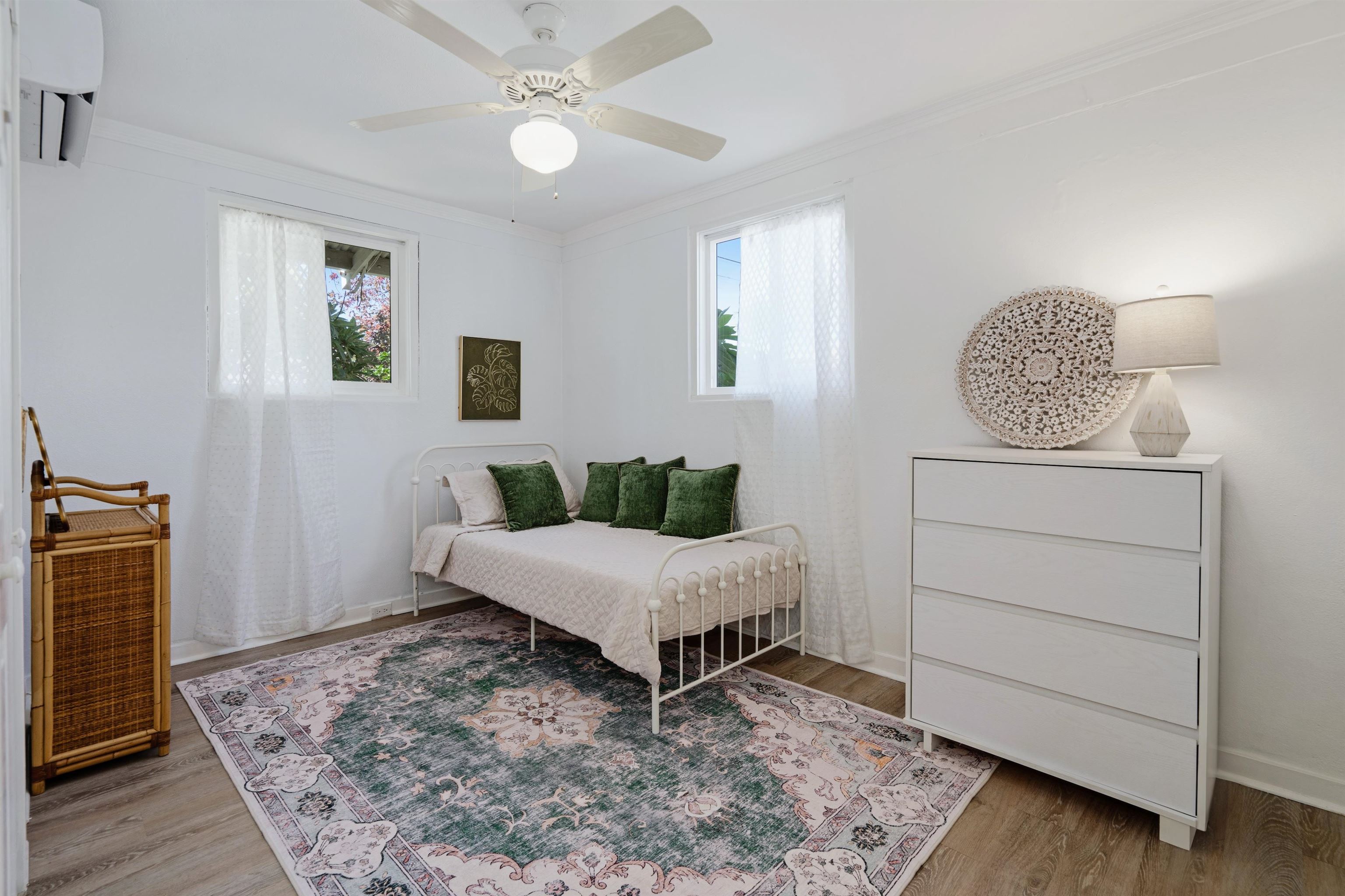 339 Manini Place Kihei, HI 96753 - Photo 13 of 34 a living room with furniture and a rug