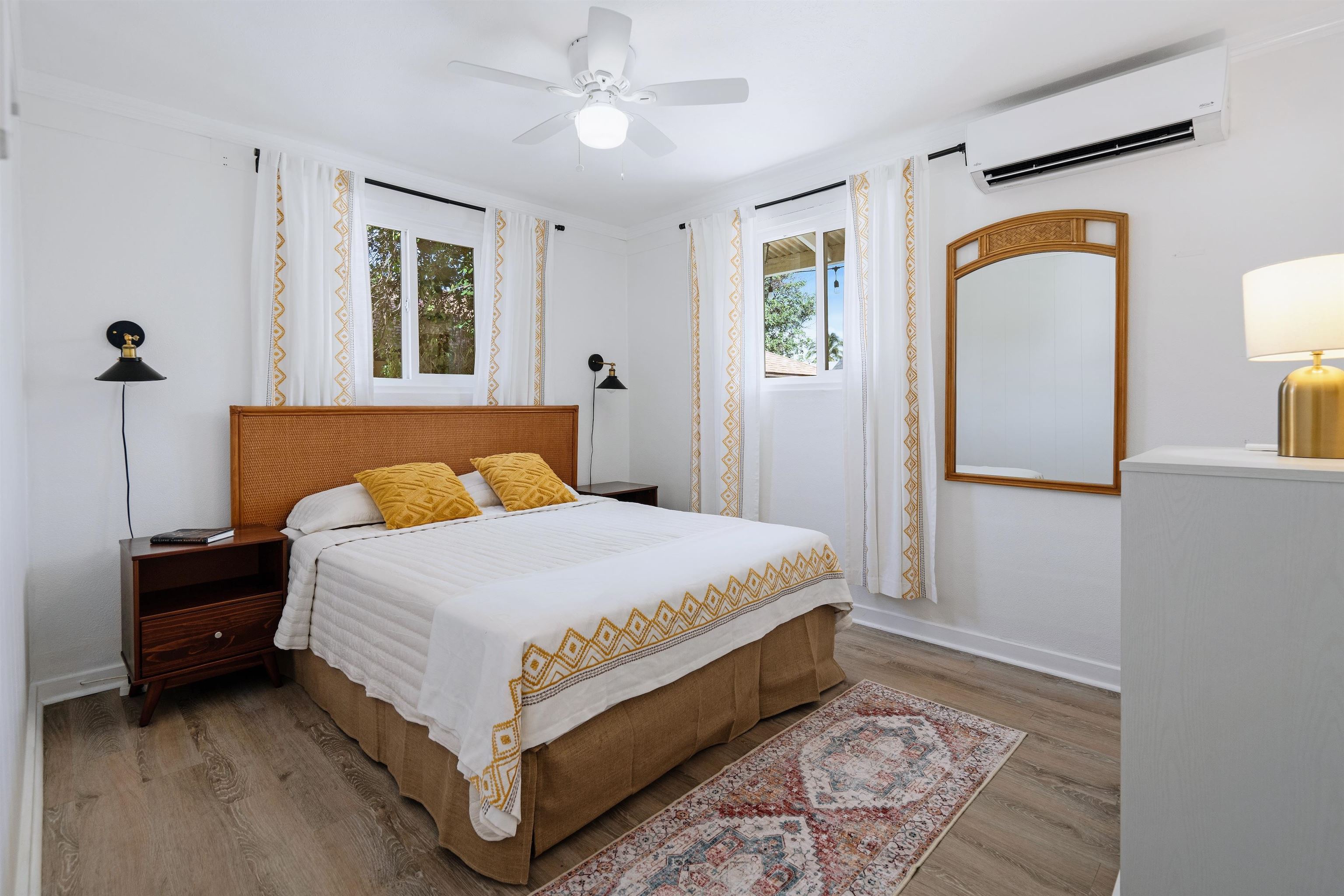 339 Manini Place Kihei, HI 96753 - Photo 15 of 34 a bedroom with a bed and a dresser