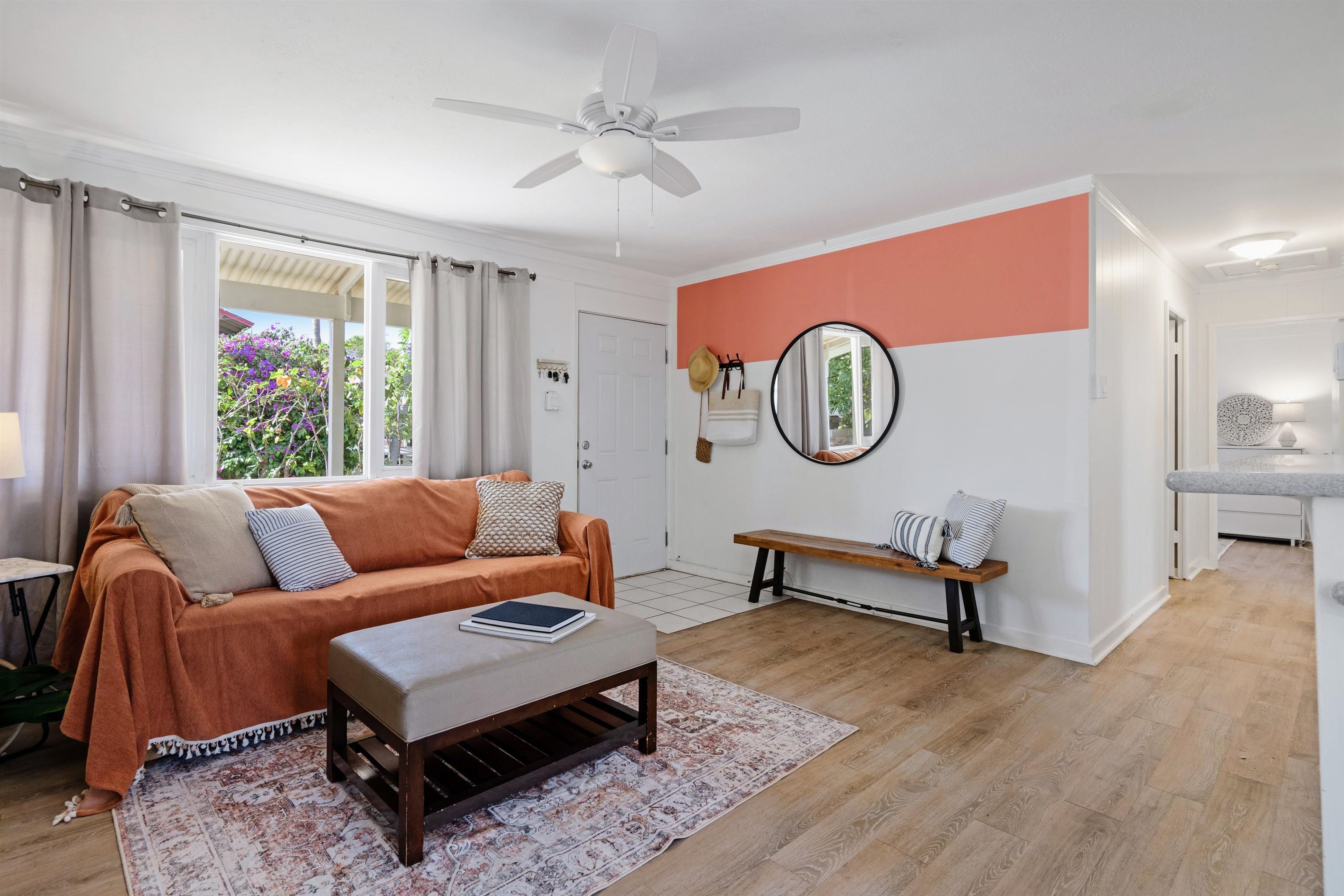 339 Manini Place Kihei, HI 96753 - Photo 2 of 34 a living room with furniture a rug and a window