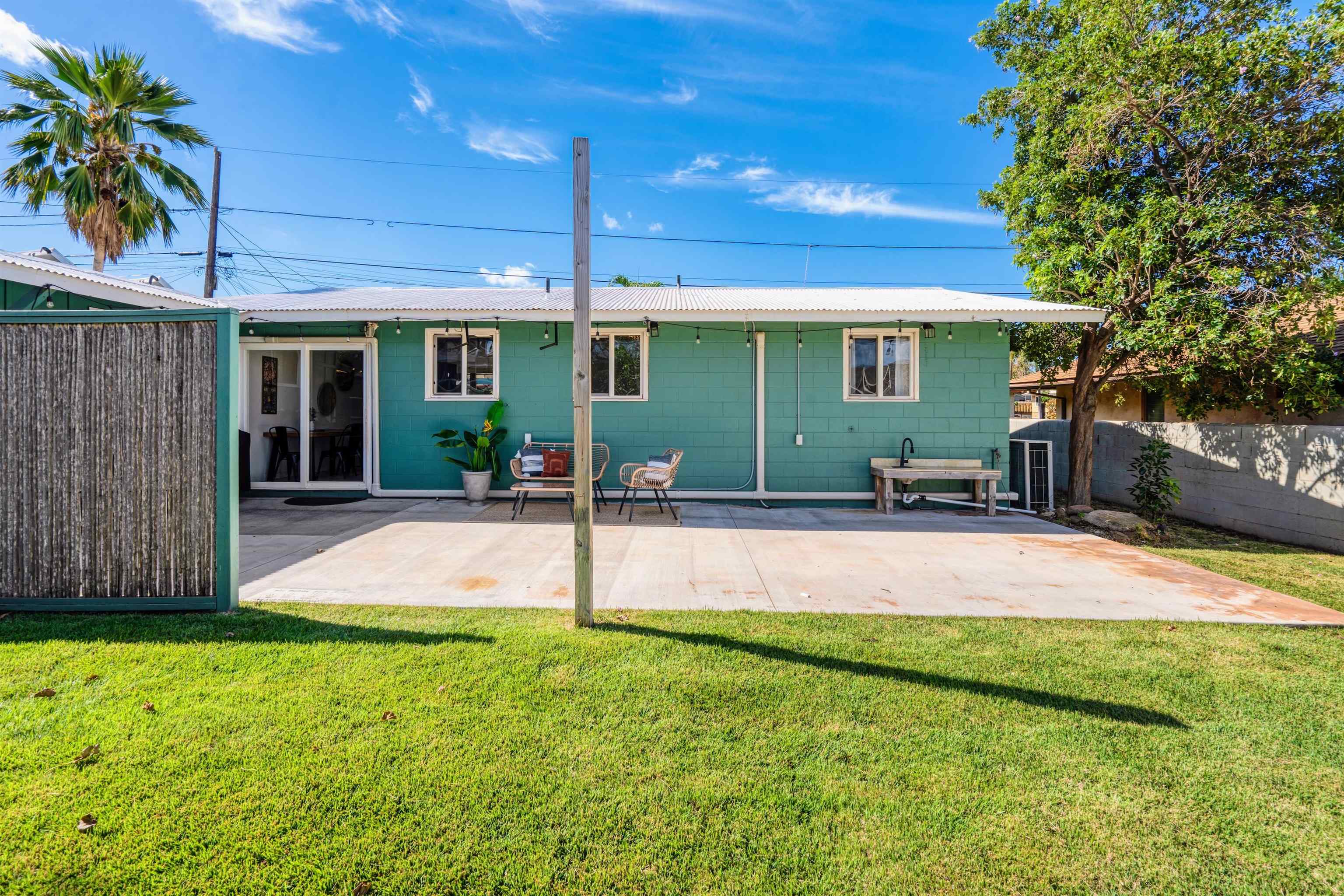 339 Manini Place Kihei, HI 96753 - Photo 22 of 34 a view of a house with backyard and porch