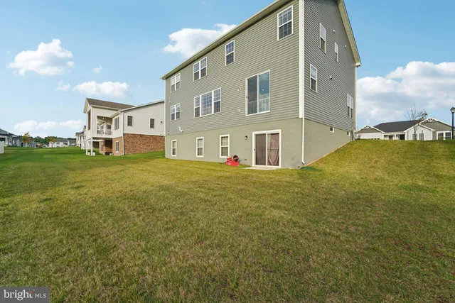 a view of a house with a big yard