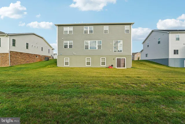 a front view of building with yard