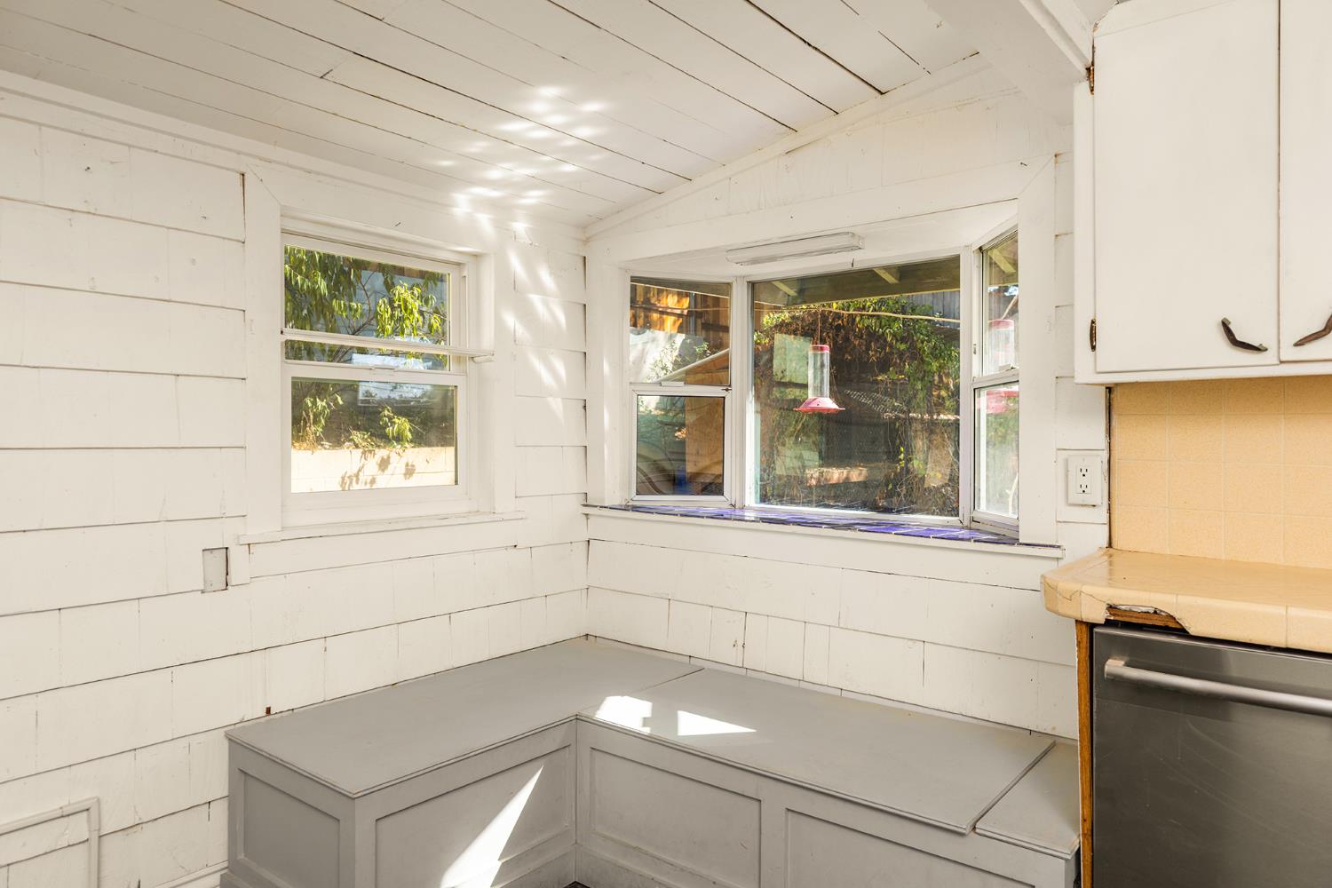 228 High Street Oak View, CA 93022 - Photo 12 of 28 a bathroom with a bathtub and a window