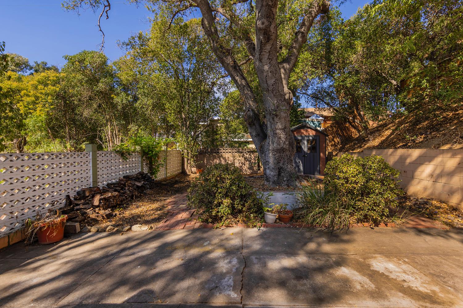 228 High Street Oak View, CA 93022 - Photo 15 of 28 a backyard of a house with lots of green space