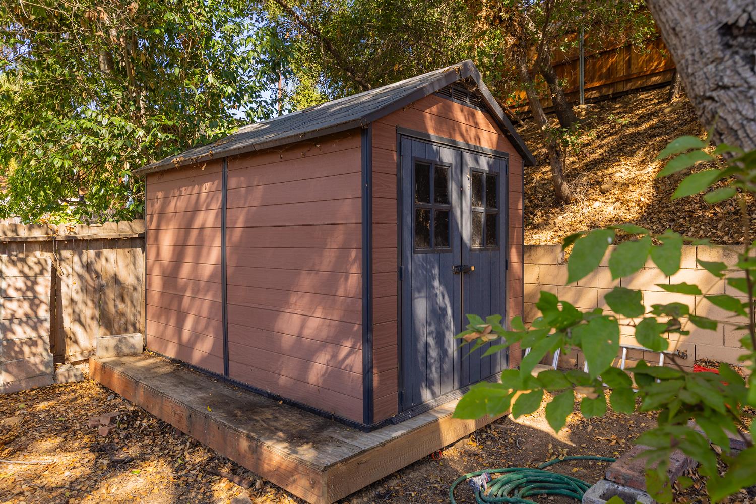 228 High Street Oak View, CA 93022 - Photo 18 of 28 a wooden door in front of a house