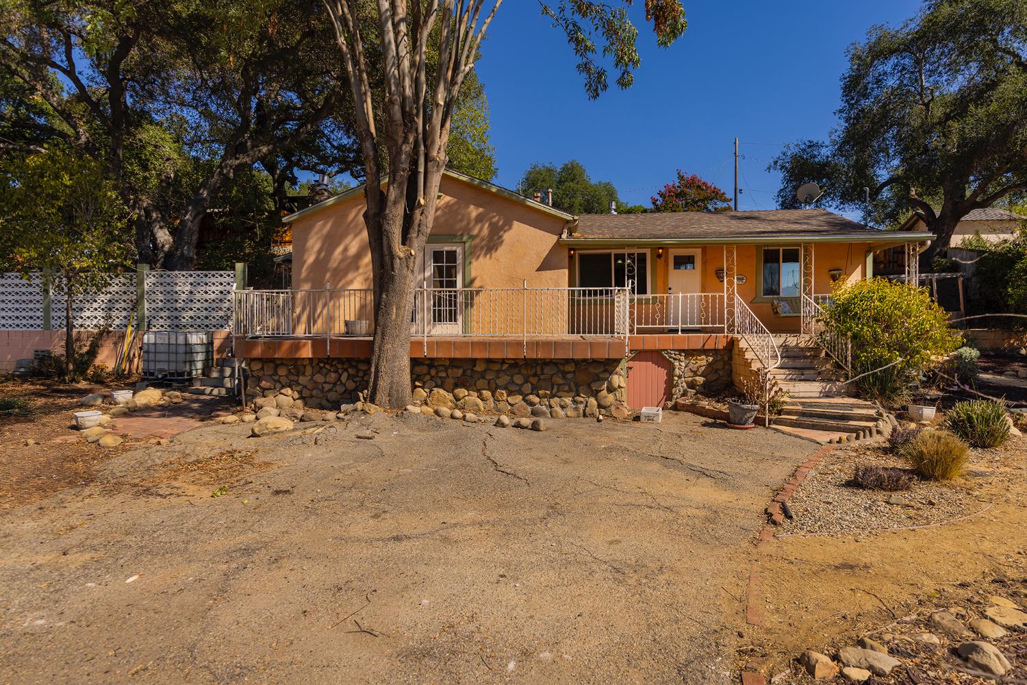228 High Street Oak View, CA 93022 - Photo 2 of 28 a front view of a house with a yard