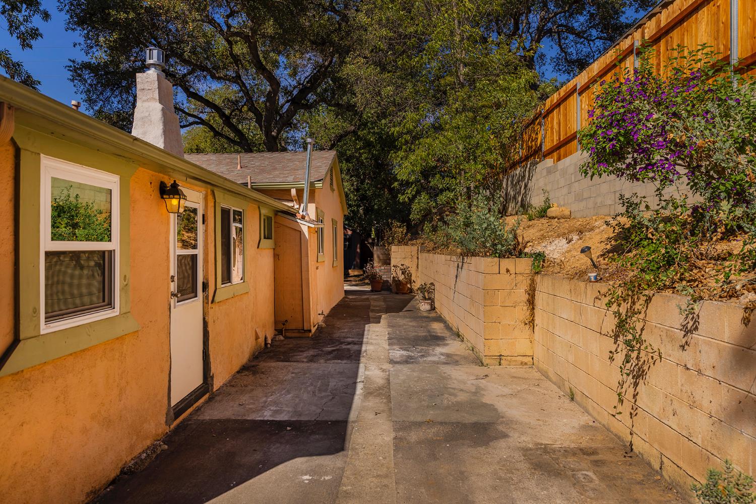 228 High Street Oak View, CA 93022 - Photo 21 of 28 a view of a pathway of a house with wooden fence