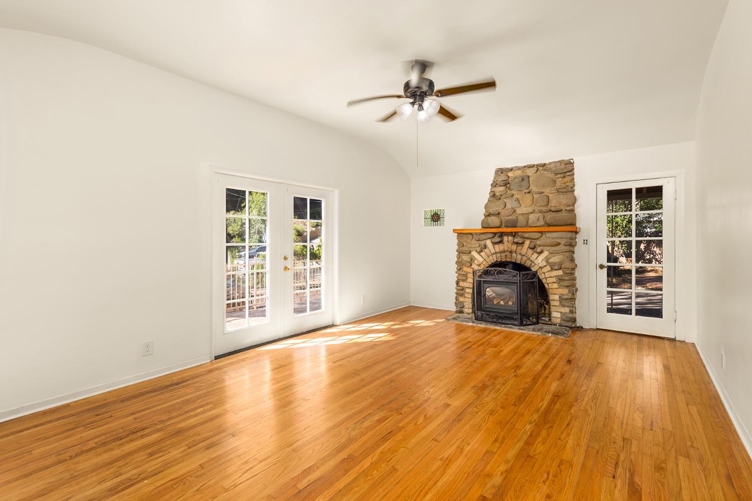 228 High Street Oak View, CA 93022 - Photo 6 of 28 a view of empty room with wooden floor and fan