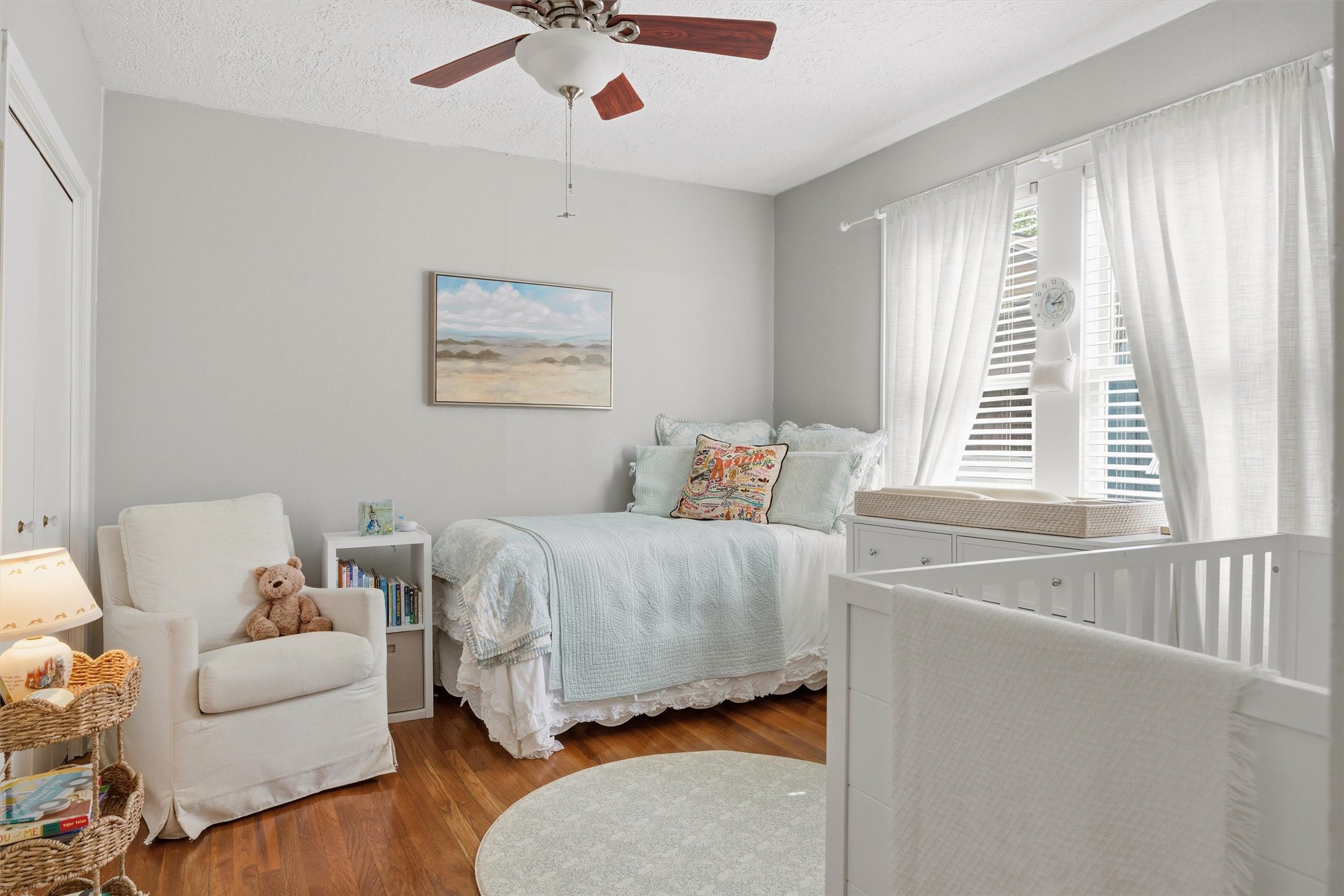 1507 Wethersfield Road Austin, TX 78703 - Photo 32 of 40 a bedroom with a bed and a couch