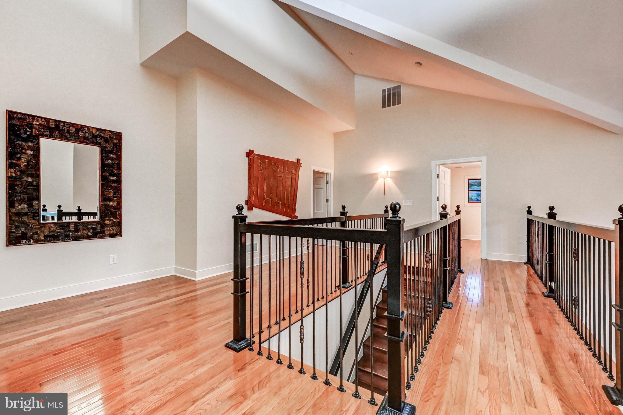14412 Cuba Road Cockeysville, MD 21030 - Photo 22 of 35 a view of a hallway with wooden floor and entryway