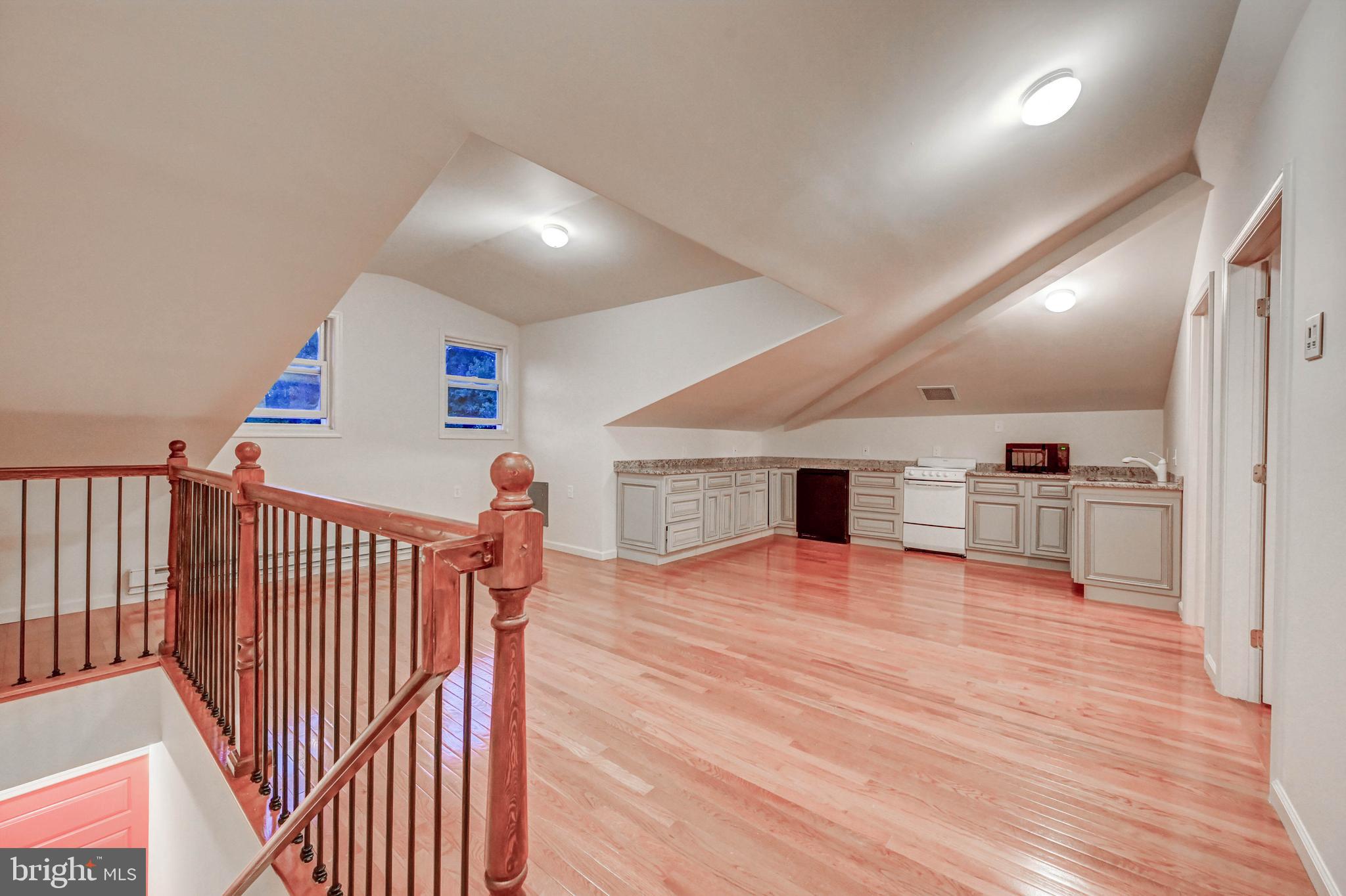 14412 Cuba Road Cockeysville, MD 21030 - Photo 28 of 35 a view of empty room with wooden floor