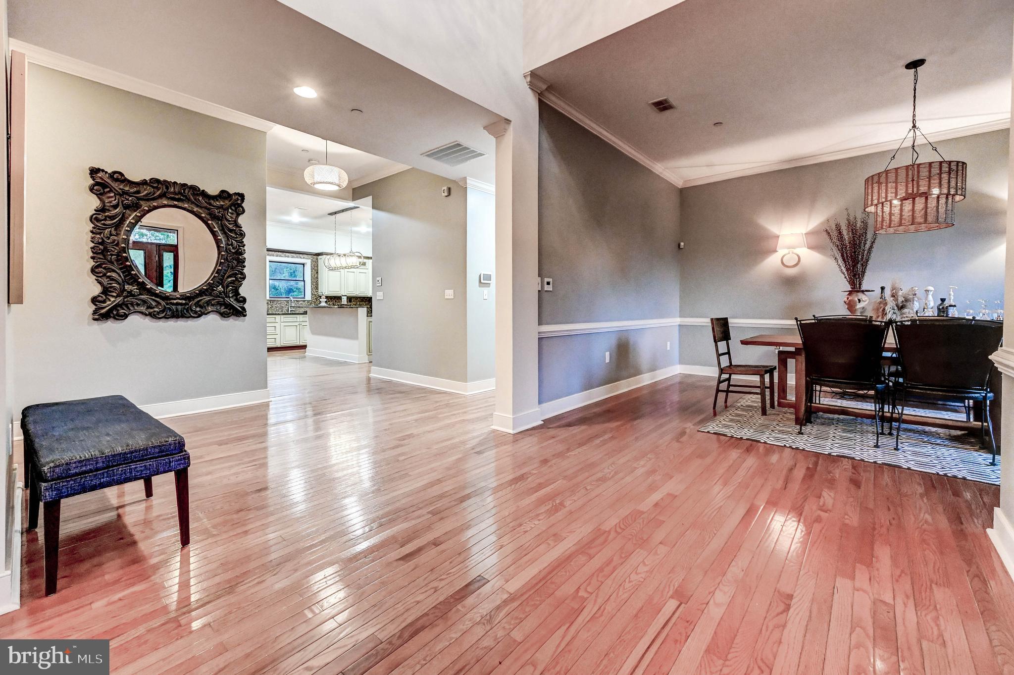 14412 Cuba Road Cockeysville, MD 21030 - Photo 33 of 35 a view of a dining room with furniture window and wooden floor