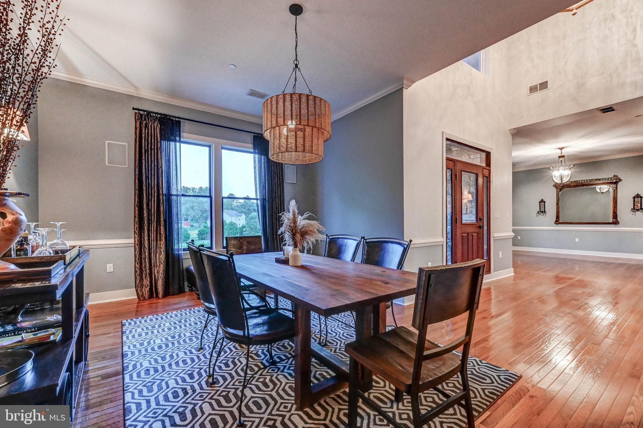 14412 Cuba Road Cockeysville, MD 21030 - Photo 8 of 35 a view of a dining room with furniture window and wooden floor
