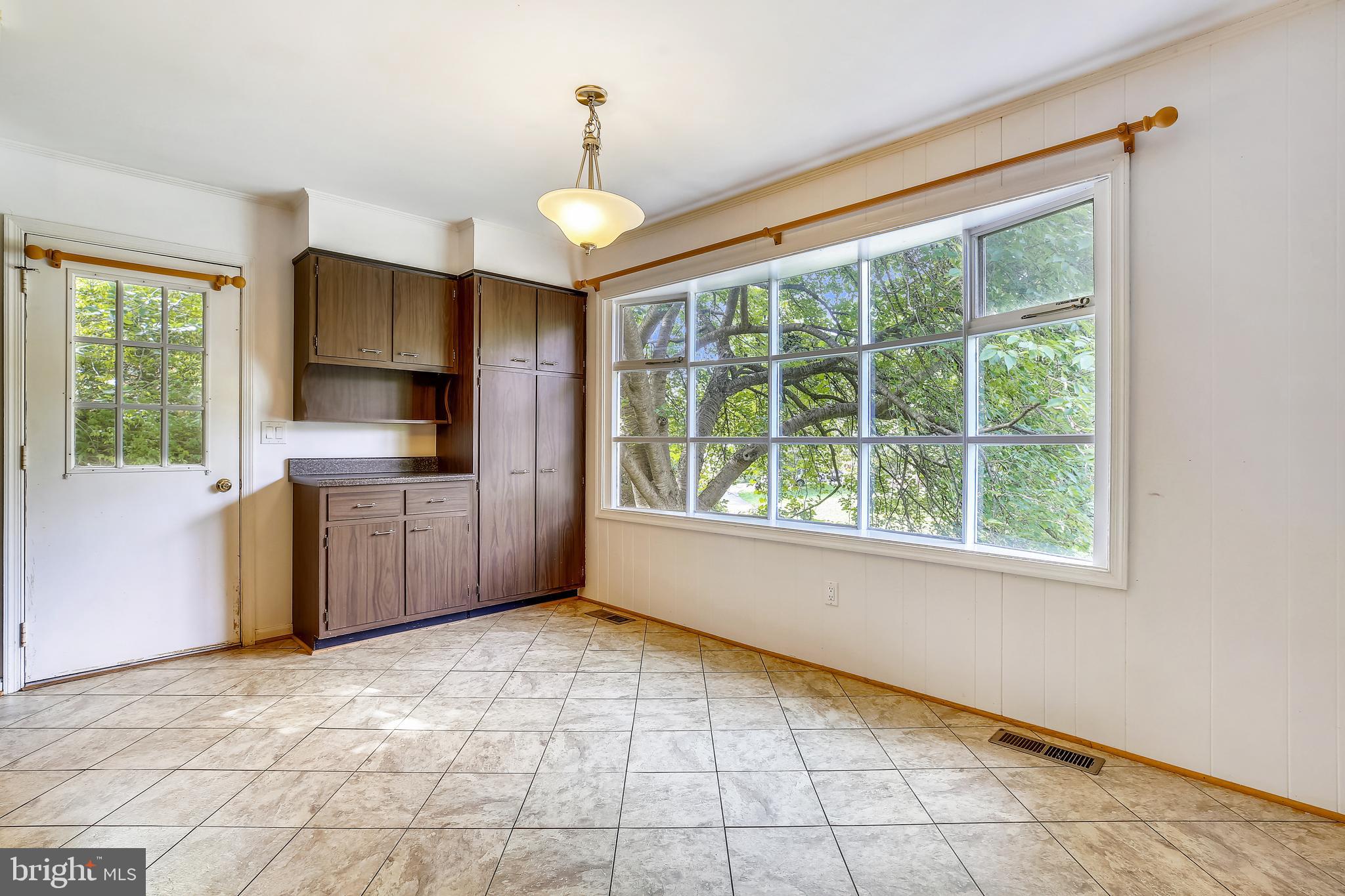 9505 Emory Grove Road Gaithersburg, MD 20877 - Photo 26 of 75 a view of a kitchen with a sink and a window