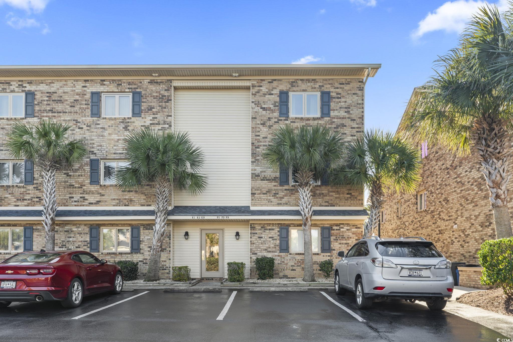 207 Double Eagle Drive, Unit F3 Myrtle Beach, SC 29575 - Photo 2 of 40 View of property featuring uncovered parking