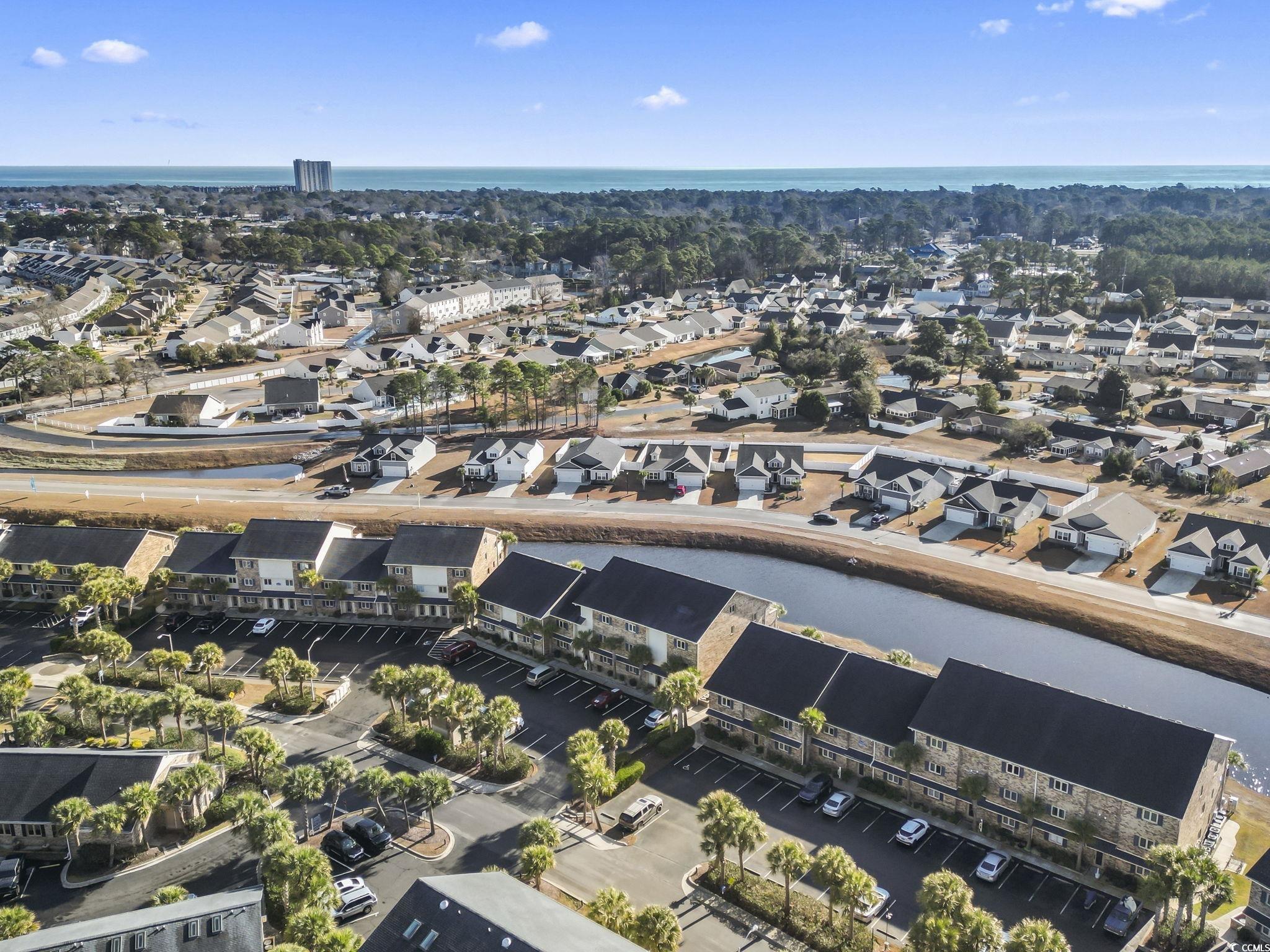 207 Double Eagle Drive, Unit F3 Myrtle Beach, SC 29575 - Photo 40 of 40 Aerial overview of property's location with a large body of water and nearby suburban area
